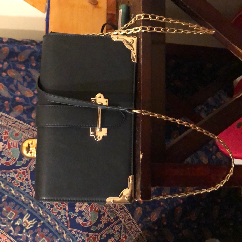 one strap purse , black and gold